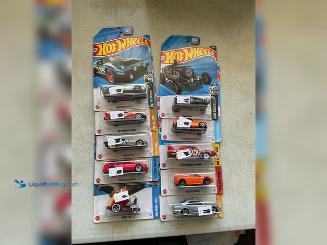 Lot 49-5515064 - Other LOT OF 10 BRAND NEW 1/64 SCALE DIECAST CARS IN ORIGINAL BOXES VARIOUS MAKES AND MODELS