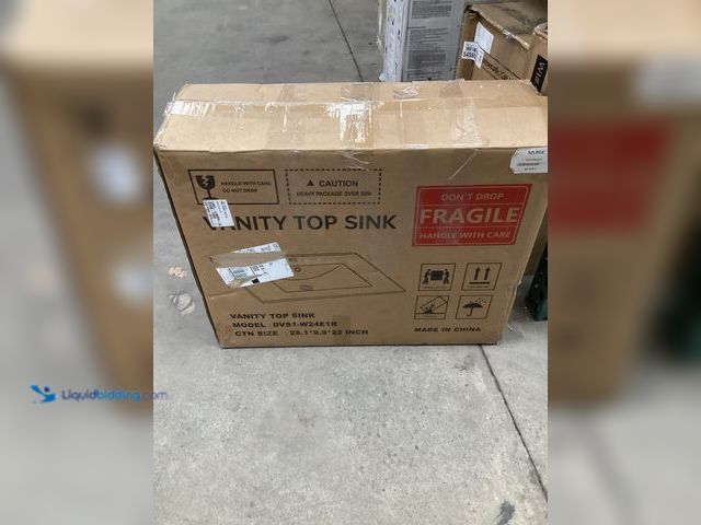 Lot 49-5454049 - Vanity top sink. Dvs1-w24e1r , item is unused. No cracks no damage