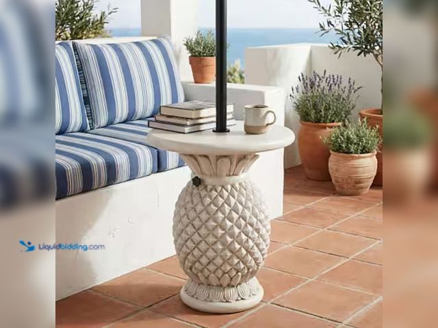 Lot 49-1632107 - White Pineapple-Shaped Metal (Magnesium Oxide) Outdoor Side Table Umbrella Base, Model # N775P385406...