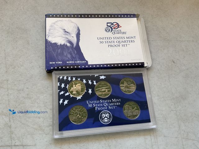 Lot 49-5515533 - 2001 UNITED STATES MINT 50 STATE QUARTERS PROOF SET 5 COINS IN HARD PLASTIC CASE AND ORIGINAL SLEEVE