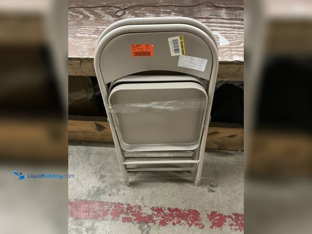 Lot 49-5549722 - QTY 2 - HDX Steel Folding Chair-Beige. Model # 00234. Unused, minor scuffs to paint