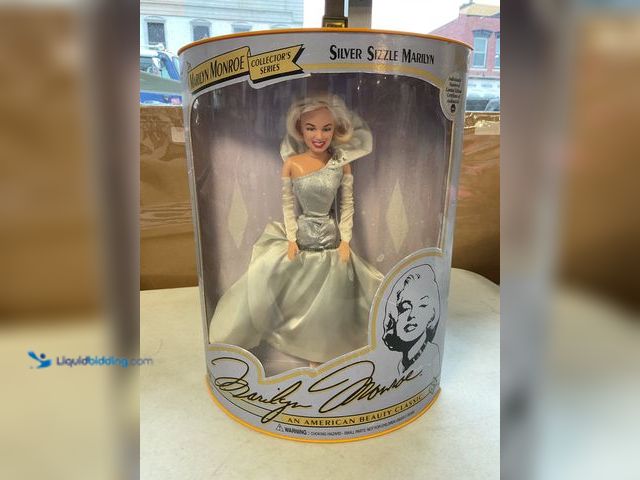 Lot 49-1814822 - COLLECTIBLE RARE! 1993 MARILYN MONROE “SILVER SIZZLE MARILYN” COLLECTOR’S SERIES FASHION DOLL IN ORI...