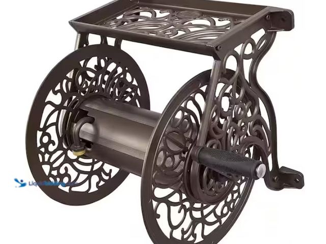 Lot 49-1567543 - Hampton Bay 125 ft. Aluminum Decorative Garden Hose Wall Mounted Reel, Bronze, Model # 704-HB, Unuse...