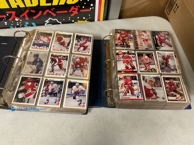 Lot 49-1505456 - COLLECTIBLE LOT OF 2 BINDERS FULL OF VARIOUS HOCKEY CARDS FROM DIFFERENT YEARS AND TYPES INCLUDING U...