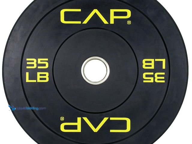 Lot 49-5463152 - 35lb CAP Barbell Rubber Olympic Bumper Plate | Economy Yellow Letters (opened to view) New