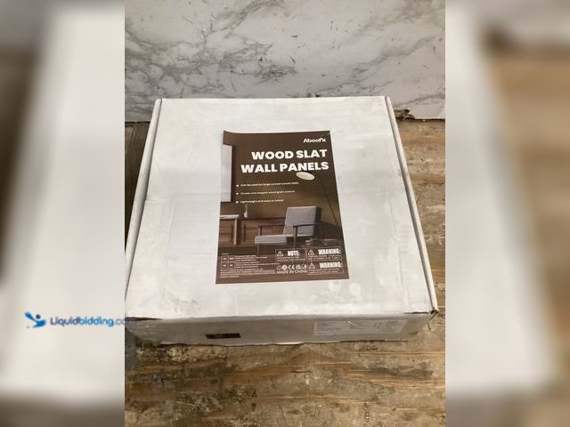 Lot 49-3527715 - Aboofx Wood Panels 3D, 12PCSWater-resistance 11.8" x 11.8", Peel & Stick (Taupe). Unused