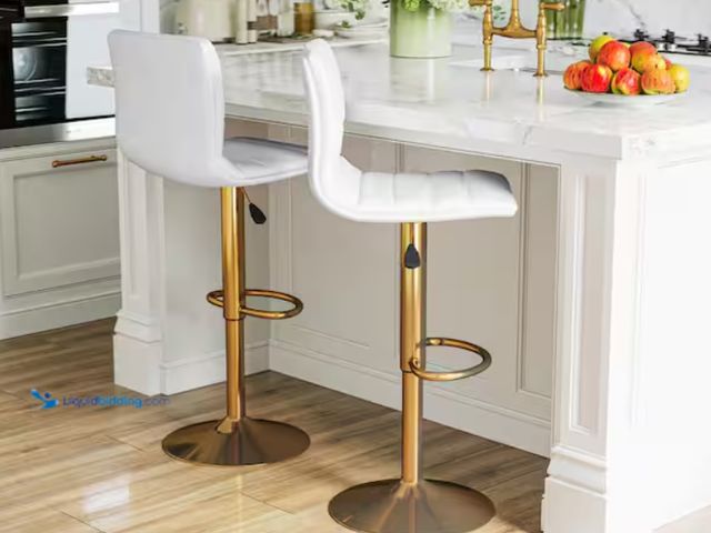 Lot 49-2000339 - Set of (2) Belnick Modern Pedestal Barstools in White and Gold, Adjustable Height, Model # 889142931...