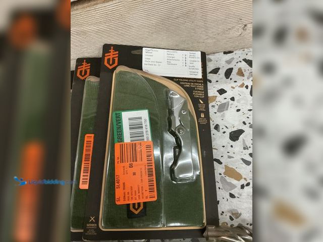 Lot 49-3539938 - Gerber E.A.B Poacket Knife. (Green) With a green beanie. New