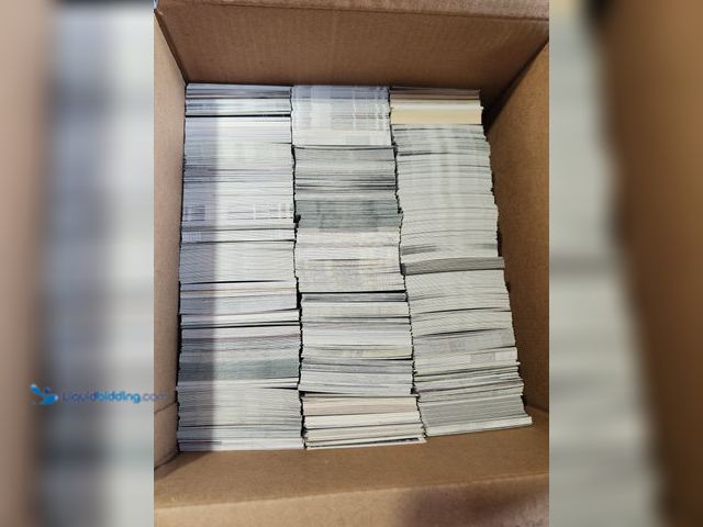 Lot 49-1817789 - BOX OF AROUND 2,000 COLLECTIBLE SPORTS CARDS. VARIOUS SPORTS BRANDS AND YEARS PRODUCED. NOTICED MANY...
