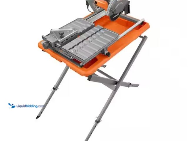 Lot 49-1578389 - RIDGID 9-Amp 7 in. Blade Corded Wet Tile Saw with Stand, Model # R4031S, Used, Works, Powers on.   R...