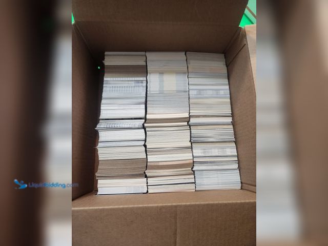 Lot 49-1913859 - BOX OF AROUND 2,000 COLLECTIBLE SPORTS CARDS. VARIOUS SPORTS BRANDS AND YEARS PRODUCED. NOTICED MANY...