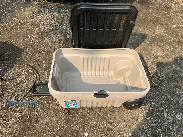 Lot 49-1910103 - One good used action packer made by a Rubbermaid 32 x 21 x 12 with handle and wheels