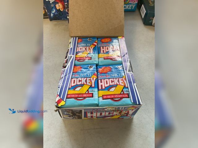 Lot 49-1830636 - COLLECTIBLE 1991-92 O-PEE-CHEE HOCKEY WAX PACK BOX OF 36 PACKS ALL SEALED #COINS0219