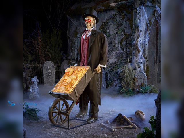 Lot 49-5556876 - Home Accents Holiday
6.5 FT Grave & Bones Animated LED Grave Robber. Model # 26PA05417. Unused with...