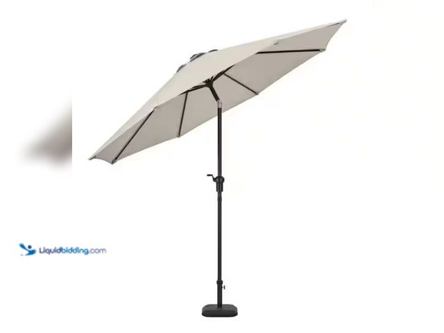 Lot 49-2005469 - Hampton Bay 9 ft. Aluminum Market Crank and Auto-Tilt Patio Umbrella in Putty Beige, Model # UCM1900...