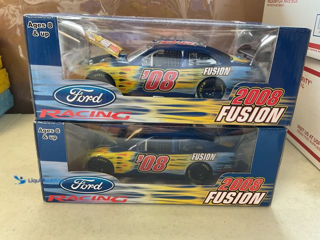 Lot 49-3503980 - LOT OF 2 FORD RACING 2008 FUSION 1/24 SCALE DIECAST CARS IN ORIGINAL BOXES