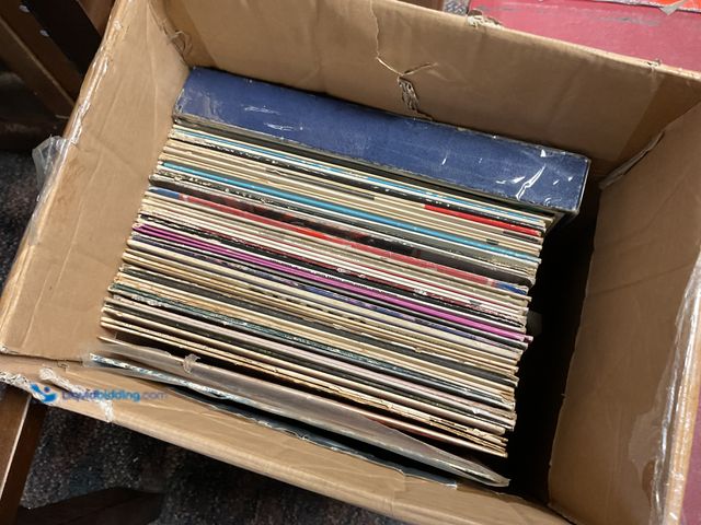 Lot 49-1830543 - COLLECTIBLE LARGE BOX FULL OF PRE-OWNED VINYL RECORDS VARIOUS GENRES AND TITLES INCLUDING Rolling St...