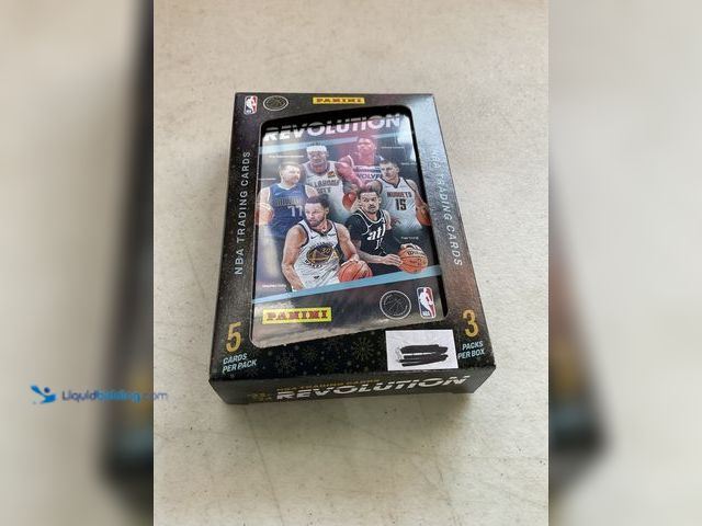 Lot 49-1505059 - COLLECTIBLE FACTORY SEALED 2023-24 PANINI REVOLUTION BASKETBALL 3 PACK TIN