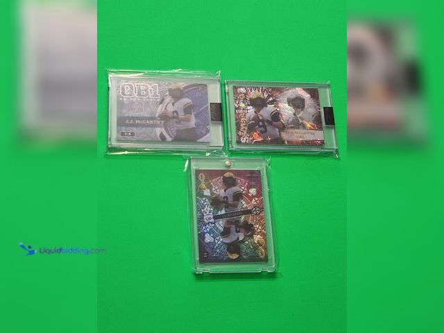 Lot 49-1913851 - 3- UNIVERSITY OF MICHIGAN LEGEND JJ MCCARTHY RARE ROOKIE FOOTBALL CARDS. INCLUDED 1/1, 7/8 AND 15/25...