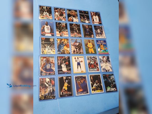 Lot 49-1817777 - 25- COLLECTIBLE SHAQUILLE ONEAL NBA BASKETBALL CARDS. VARIOUS BRANDS AND YEARS PRODUCED. INCLUDES 2 ...