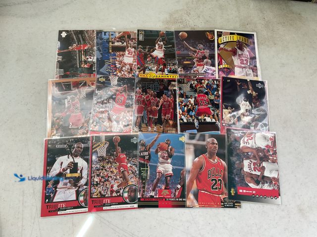 Lot 49-1810340 - COLLECTIBLE 15 MICHAEL JORDAN BASKETBALL CARDS FROM VARIOUS YEARS AND TYPES