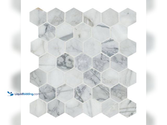 Lot 49-2024911 - Approx. (9) Sq. Ft. of  MSI Calacatta Cressa 12.38 x 12.38 in. Honed Hexagon Mosaic Tile with Distin...