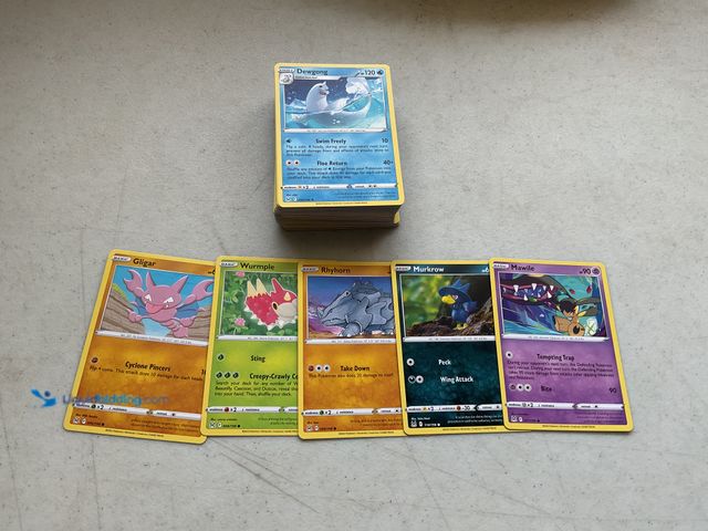Lot 49-1804507 - 80+ POKEMON CARDS FROM VARIOUS YEARS.