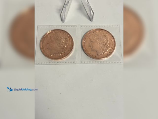 Lot 49-910404 - Lot of 2 Morgan Dollar Design Copper Rounds – Collectible Bullion Style Tokens This auction features...