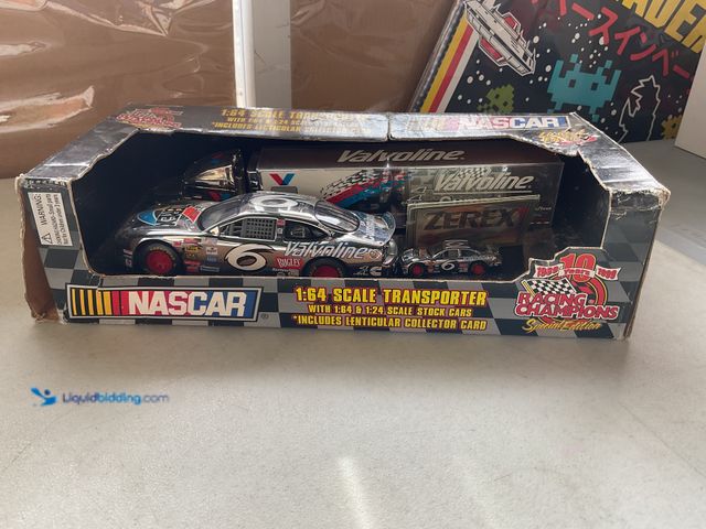Lot 49-5496017 - Other RACING CHAMPIONS NASCAR 1/64 SCALE TRANSPORTER WITH 1/64 AND 1/24 SCALE STOCK CARS AND COLLECT...