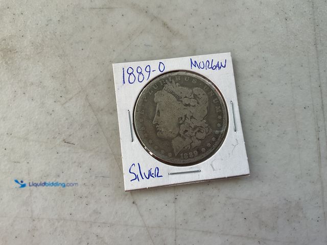 Lot 49-1811272 - 1889-O MORGAN SILVER DOLLAR COIN 90% SILVER