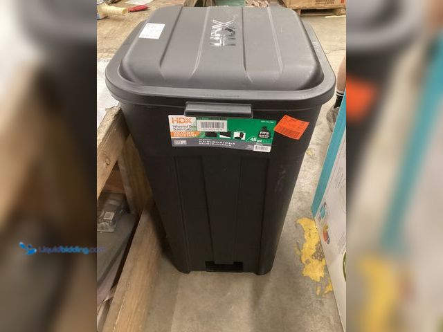 Lot 49-3566922 - 45 gal. Black Heavy Duty Outdoor Trash Can with Wheels and Attached Lid
UPC 840254200647, Unused