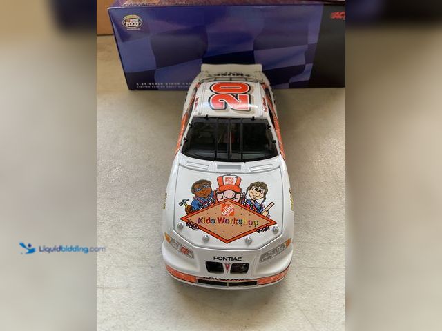 Lot 49-5515598 - Other ACTION RACING TONY STEWART #20 HOME DEPOT/KIDS WORKSHOP 2000 GRAND PRIX 1/24 SCALE DIECAST CAR...