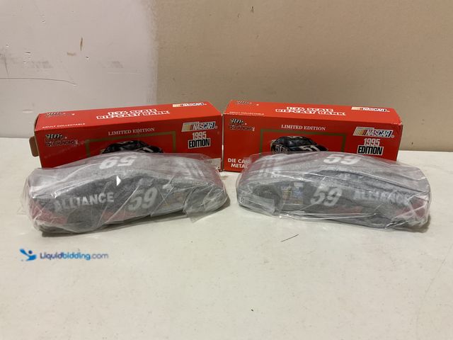 Lot 49-1835335 - Other WOW AMAZING LOT OF 2 BRAND NEW IN ORIGINAL PACKAGING 1:24 SCALE DIE CAST NASCAR BANK #59 ALLIA...