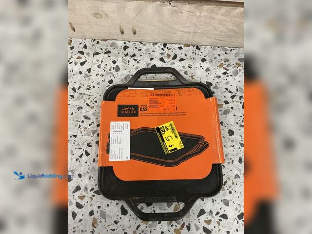 Lot 49-5485656 - Traeger Induction Cast Iron Skillet. Model # BAC620. Unused with scuffs and scratches.