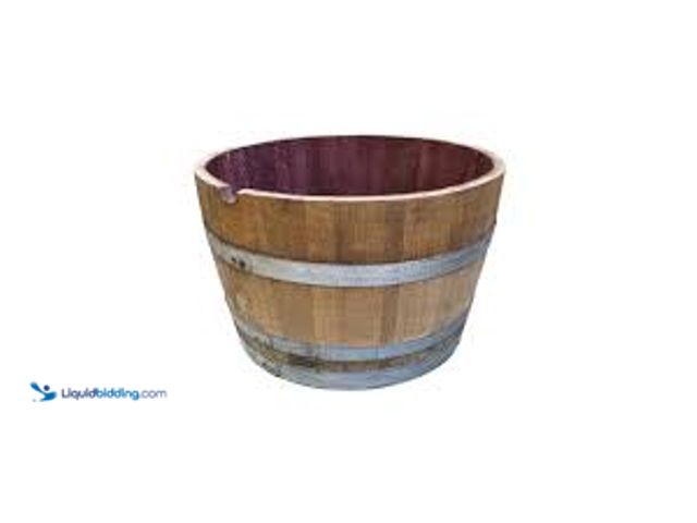 Lot 49-5448837 - 27.5 in. Wood Oak Wine Barrel Planter. Model # OWBP. Unused