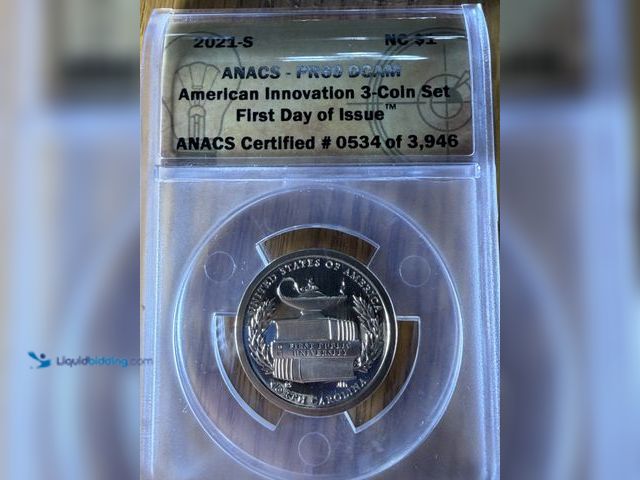 Lot 49-1975134 - 1 2021 Gold in color . Beautiful