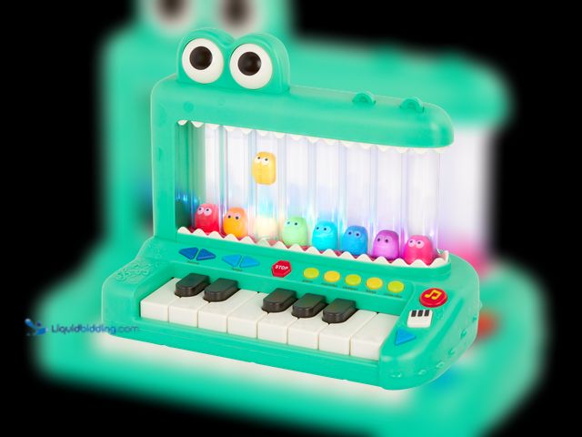 Lot 49-1627179 - Battat Croco Pop Piano Toy Keyboard with Songs Sounds Lights, Baby and Toddler Toys Model #BT1801, U...