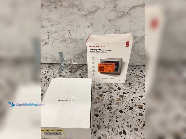 Lot 49-3528097 - Honeywell Home
Wi-Fi Smart Color 7-Day Programmable Smart Thermostat with Color-Changing Touchscree...