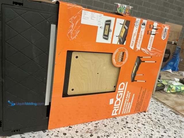 Lot 49-5485148 - 22 in. W x 34.6 in. D Portable Work Table with Plastic Top and Wood Router Plate. UPC 731161061455. ...