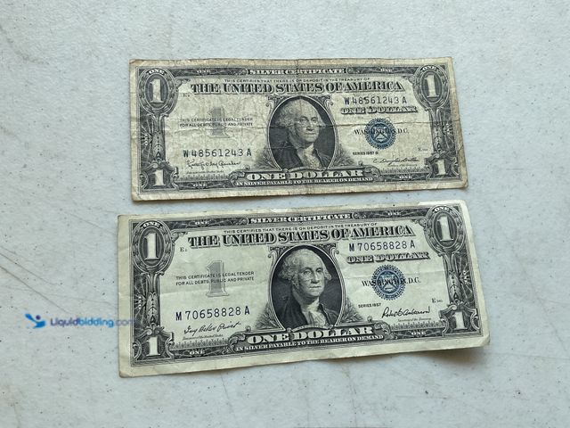 Lot 49-1804345 - 1957 AND 1957 B BLUE SEAL UNITED STATES ONE DOLLAR SILVER CERTIFICATES.