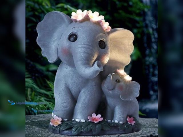 Lot 49-3527632 - QTY 2 - Garden Decor Solar Garden Statues ELEPHANT. Model #B0DT4CGL7J. Unused.