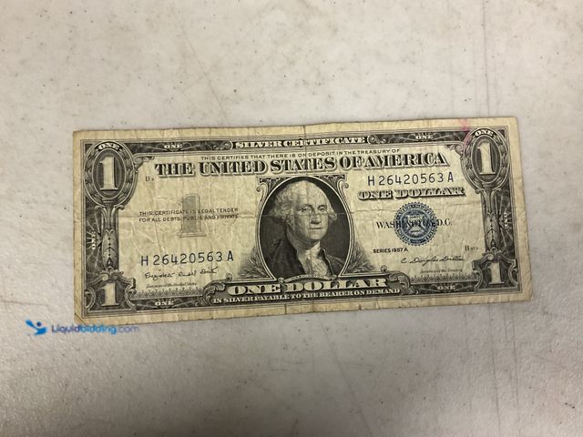 Lot 49-1505671 - 1957 A BLUE SEAL UNITED STATES ONE DOLLAR SILVER CERTIFICATE #COINS1211