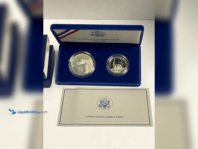 Lot 49-910561 - Official 1986 United States Liberty Coin commemorating the centennial of the Statue of Liberty, pres...