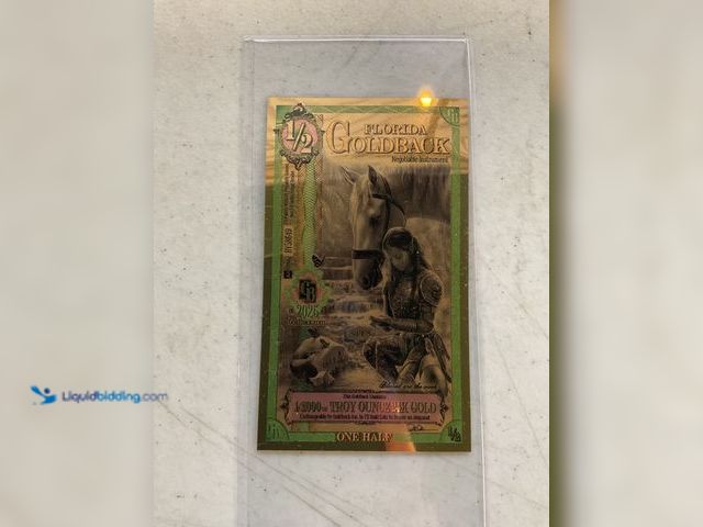 Lot 49-1804573 - 1/2 FLORIDA GOLDBACK 1/2000TH TROY OUNCE 24K GOLD