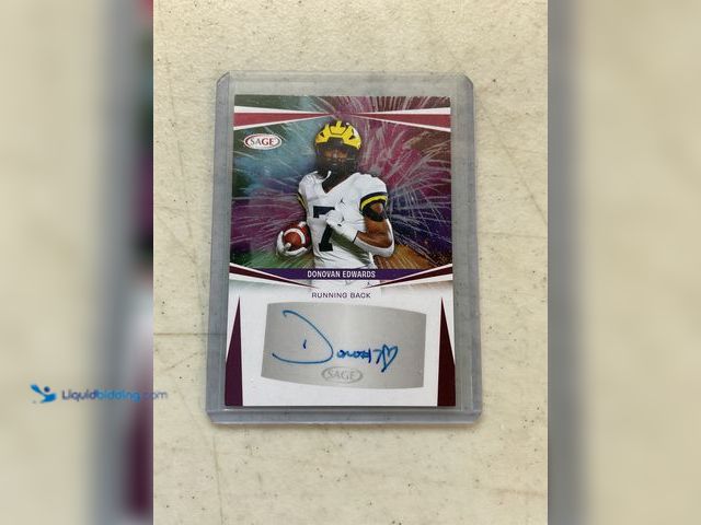 Lot 49-1505585 - COLLECTIBLE 2025 SAGE DONOVAN EDWARDS (UNIVERSITY OF MICHIGAN) AUTOGRAPHED FOOTBALL CARD #COINS1211