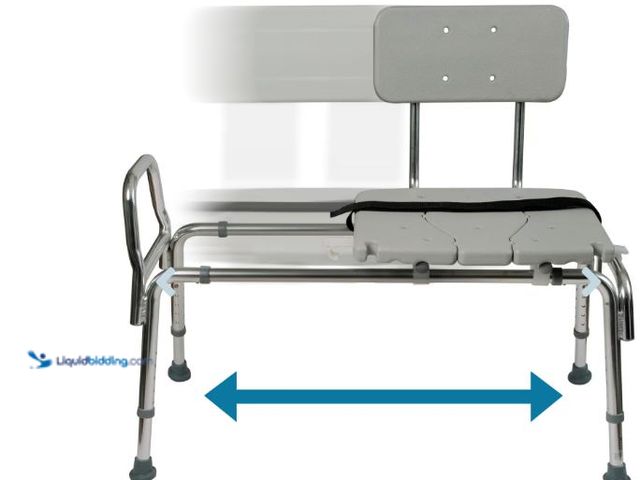 Lot 49-3528130 - DMI® Sliding Transfer Bench Shower Chair with Cut-Out Seat. Item is unused.