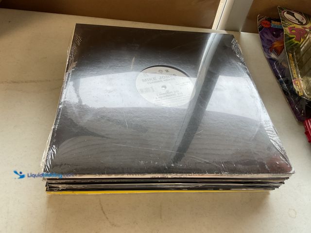 Lot 49-5341513 - LOT OF 20 BRAND NEW VINYL RECORDS VARIOUS YEARS AND TYPES INCLUDING MIKE JONES, THE BEATNUTS, DIDDY,...
