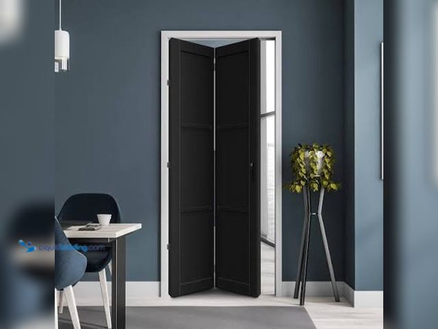 Lot 49-2020988 - Black Bifold Doors 30" *80 3/4". Used, Has attachments. Scuffs & Scratches, shipping damage. NOTE: M...