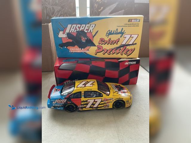 Lot 49-1977484 - Other ACTION RACING ROBERT PRESSLEY #77 JASPER ENGINES &amp; TRANSMISSIONS 1999 FORD TAURUS 1 OF 2,5...