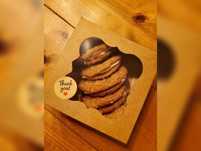 Lot 499-500 - A batch of 5 soft, chewy oatmeal cookies filled with fluffy cream - made fresh from scratch! These t...